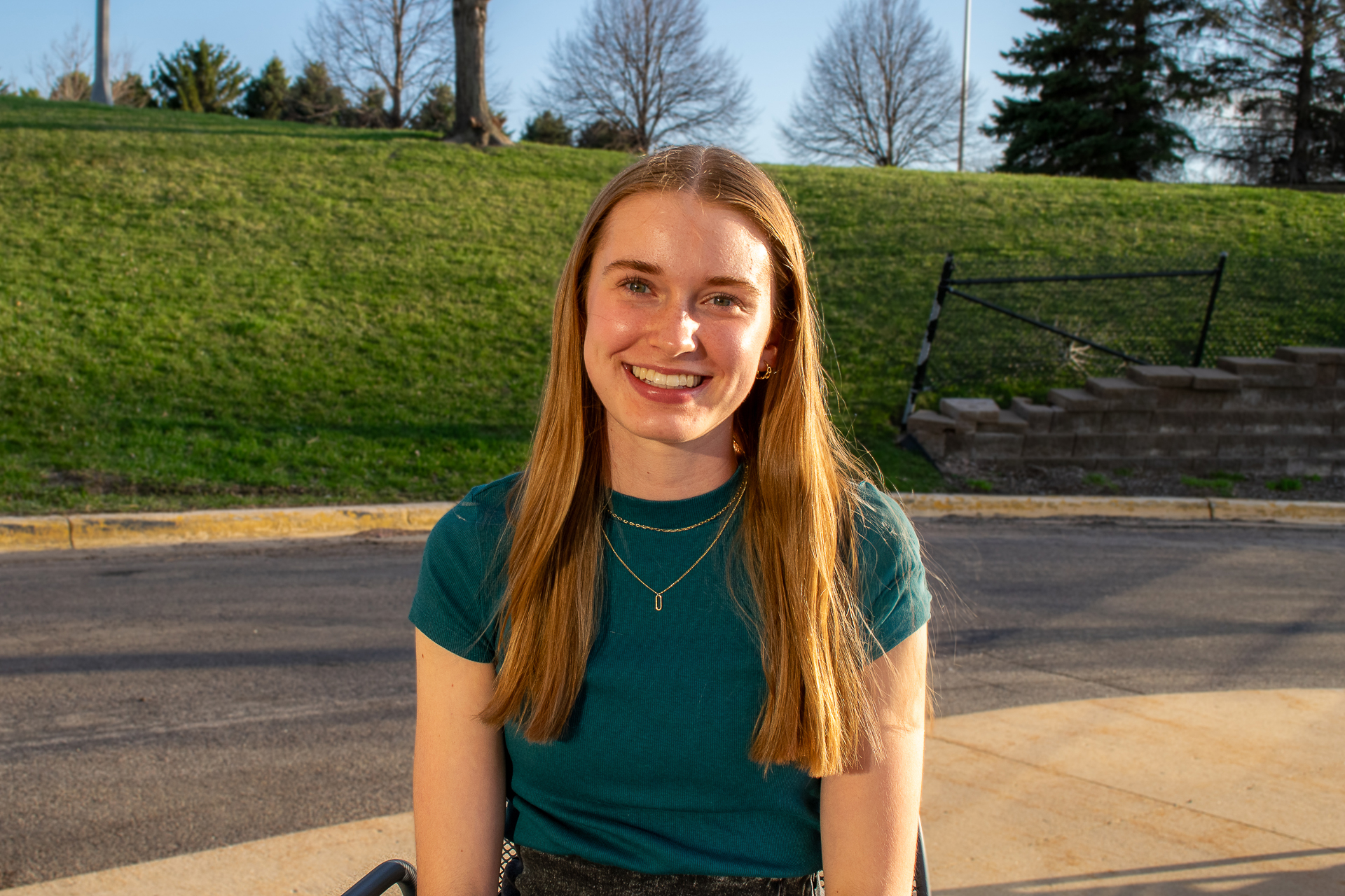 young blonde white woman smiling